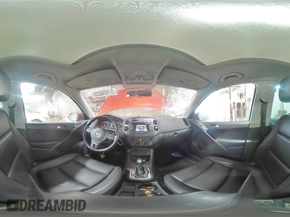 2013 Volkswagen Tiguan SE z VIN WVGBV3AX8DW092397, wystawiony jako Copart lot #51956225 z przebiegiem 138 901 mil mil oraz Szkoda całkowita • Salvage title. Historia ofert i sprzedaży dostępna na DreamBid. Obrazek 14.