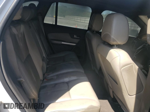 2013 Ford Edge Limited z VIN 2FMDK3KC1DBA39815, wystawiony jako Copart lot #52319795 z przebiegiem 223 758 mil mil oraz Szkoda całkowita • Salvage title. Historia ofert i sprzedaży dostępna na DreamBid. Obrazek 11.