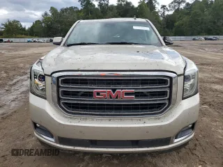 2015 GMC Yukon XL SLT with VIN 1GKS1HKC5FR168608, listed as a Copart auction lot 71564384 with 197,538 mi miles and Salvage Title. Bid and sale history available at carsss.com. Image 5.