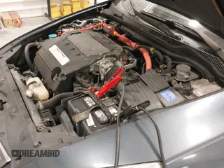 2005 Honda Accord with VIN JHMCN36415C004816, listed as a IAAI auction lot 42033190 with 227,107 mi miles and . Bid and sale history available at DreamBid. Image 12.