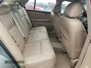 2006 Cadillac DTS 1SC z VIN 1G6KD57Y26U182388, wystawiony jako Copart lot #71929184 z przebiegiem 91 711 mil mil oraz Szkoda całkowita • Salvage title. Historia ofert i sprzedaży dostępna na DreamBid. Obrazek 10.