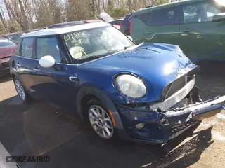 2015 MINI Cooper Hardtop 4 Door with VIN WMWXS5C57FT827124, listed as a IAAI auction lot 41806392 with 114,110 mi miles. Bid and sale history available at carsss.com. Image 1.