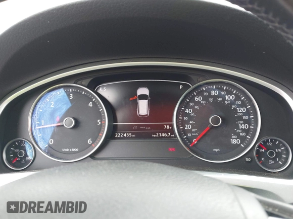 2012 Volkswagen Touareg Sport with VIN WVGFK9BP0CD002939, listed as a IAAI auction lot 42531654 with 222,435 mi miles and . Bid and sale history available at DreamBid. Image 7.