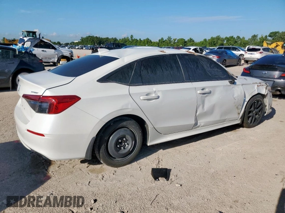 2023 Honda Civic Sport with VIN 2HGFE2F57PH511027, listed as a Copart auction lot 62703695 with 33,899 mi miles and Salvage title. Bid and sale history available at DreamBid. Image 3.