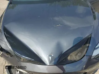 2023 Tesla Model Y Long Range z VIN 7SAYGDEE2PA041350, wystawiony jako Copart lot #56657005 z przebiegiem 25 090 mil mil oraz Szkoda całkowita • Salvage title. Historia ofert i sprzedaży dostępna na DreamBid. Obrazek 11.