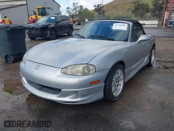2002 Mazda MX-5 Miata Cloth with VIN JM1NB353X20223041, listed as a IAAI auction lot 41740060 with 177,934 mi miles and . Bid and sale history available at DreamBid. Image 2.