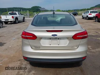 2017 Ford Focus SE with VIN 1FADP3F20HL237823, listed as a IAAI auction lot 39690628 with 104,747 mi miles and . Bid and sale history available at DreamBid. Image 17.