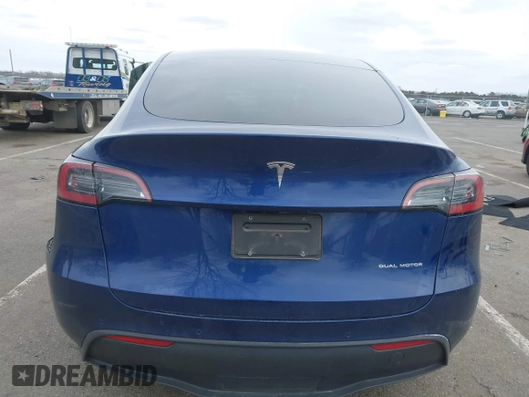2022 Tesla Model Y Long Range with VIN 7SAYGDEE1NF329909, listed as a IAAI auction lot 41628643 with 32,824 mi miles. Bid and sale history available at carsss.com. Image 16.