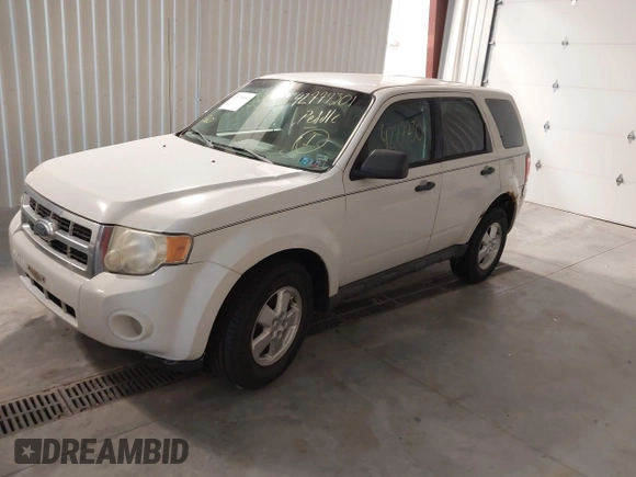 2011 Ford Escape XLS with VIN 1FMCU9C7XBKA40863, listed as a IAAI auction lot 42777301 with 219,848 mi miles and . Bid and sale history available at DreamBid. Image 2.