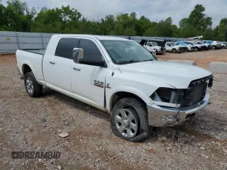 2015 Ram 2500 Laramie with VIN 3C6UR5NL4FG569422, listed as a Copart auction lot 62017655 with 100,400 mi miles and Salvage title. Bid and sale history available at DreamBid. Image 4.