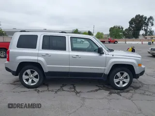 2014 Jeep Patriot Limited with VIN 1C4NJRCB0ED504715, listed as a IAAI auction lot 42080254 with 198,380 mi miles. Bid and sale history available at carsss.com. Image 13.