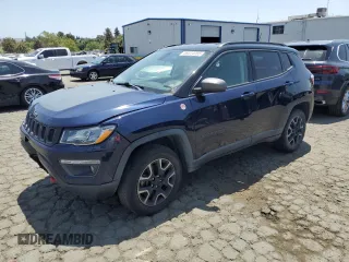 2019 Jeep Compass Trailhawk z VIN 3C4NJDDB0KT721477, wystawiony jako Copart lot #59374765 z przebiegiem 114 052 mil mil oraz Czysty tytuł • Clean title. Historia ofert i sprzedaży dostępna na DreamBid. Obrazek 1.