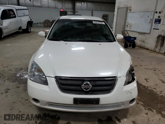 2002 Nissan Altima SL with VIN 1N4AL11D92C285520, listed as a Copart auction lot 85978794 with 128,788 mi miles and Salvage Title. Bid and sale history available at carsss.com. Image 5.