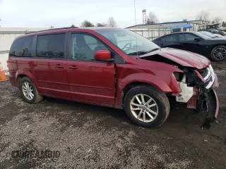 2015 Dodge Grand Caravan SXT with VIN 2C4RDGCG3FR625083, listed as a Copart auction lot 42409455 with 117,217 mi miles and Salvage Title. Bid and sale history available at DreamBid. Image 4.