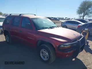 1999 Dodge Durango z VIN 1B4HS28Y8XF690099, wystawiony jako IAAI lot #41517984 z przebiegiem 236 083 mil mil oraz . Historia ofert i sprzedaży dostępna na DreamBid. Obrazek 1.