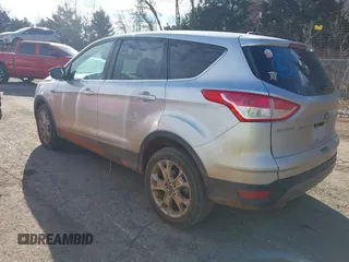 2013 Ford Escape SEL with VIN 1FMCU9H92DUD87086, listed as a IAAI auction lot 41614977 with 100,478 mi miles and . Bid and sale history available at DreamBid. Image 3.
