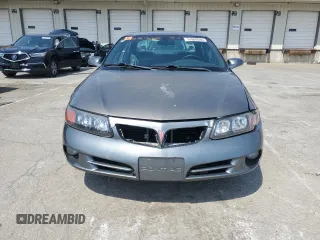 2004 Pontiac Bonneville SE z VIN 1G2HX52K94U178888, wystawiony jako Copart lot #51669505 z przebiegiem 184 886 mil mil oraz Szkoda całkowita • Salvage title. Historia ofert i sprzedaży dostępna na DreamBid. Obrazek 5.
