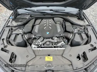 2023 BMW 5 Series M550i xDrive with VIN WBA13BK06PCN02733, listed as a Copart auction lot 48767235 with 27,725 mi miles and Salvage title. Bid and sale history available at DreamBid. Image 11.