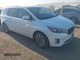 2015 Kia Sedona EX with VIN KNDMC5C12F6034991, listed as a IAAI auction lot 41971340 with 148,231 mi miles. Bid and sale history available at carsss.com. Image 1.