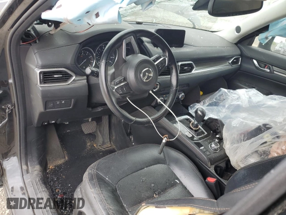 2018 Mazda CX-5 Grand Touring with VIN JM3KFADM3J1370114, listed as a Copart auction lot 54579585 with 65,513 mi miles and Salvage Title. Bid and sale history available at DreamBid. Image 8.