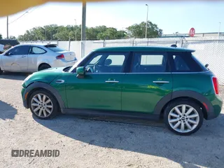 2020 MINI Hardtop 4 Door Cooper with VIN WMWXU7C06L2M63032, listed as a IAAI auction lot 42572567 with 86,220 mi miles and . Bid and sale history available at DreamBid. Image 14.