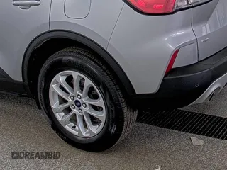 2022 Ford Escape SE with VIN 1FMCU9G64NUB33193, listed as a IAAI auction lot 42733930 with 73,871 mi miles and . Bid and sale history available at DreamBid. Image 27.