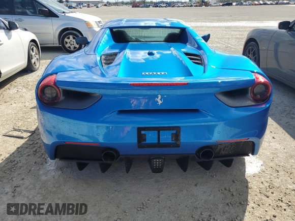 2018 Ferrari 488 z VIN ZFF80AMA9J0231686, wystawiony jako Copart lot #77623854 z przebiegiem Nie podano mil oraz Szkody całkowita. Historia ofert i sprzedaży dostępna na DreamBid. Obrazek 6.