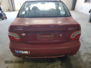1999 Hyundai Accent z VIN KMHVF24N5XU575750, wystawiony jako Copart lot #52190805 z przebiegiem 205 655 mil mil oraz Tytuł czysty. Historia ofert i sprzedaży dostępna na DreamBid. Obrazek 6.