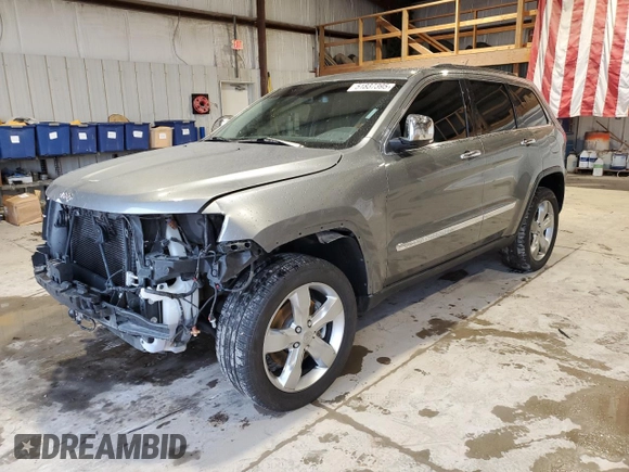 2013 Jeep Grand Cherokee Overland with VIN 1C4RJFCT5DC599866, listed as a Copart auction lot 51837395 with 105,521 mi miles and Salvage Title. Bid and sale history available at carsss.com. Image 1.