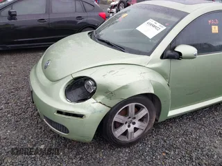 2006 Volkswagen New Beetle Coupe with VIN 3VWRW31C06M402944, listed as a IAAI auction lot 41858922 with 97,518 mi miles. Bid and sale history available at carsss.com. Image 6.
