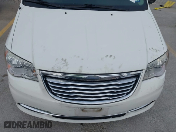 2013 Chrysler Town & Country Touring-L with VIN 2C4RC1CG2DR508799, listed as a IAAI auction lot 42092504 with 140,775 mi miles. Bid and sale history available at carsss.com. Image 6.