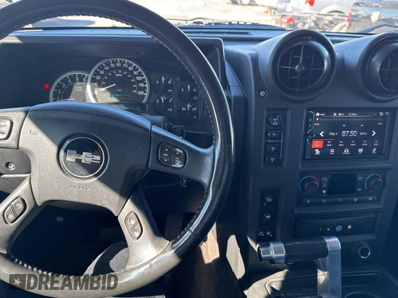 2005 Hummer H2 SUT with VIN 5GRGN22U35H113041, listed as a Copart auction lot 76730334 with 269,232 mi miles and Clean Title. Bid and sale history available at carsss.com. Image 9.