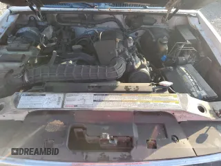1999 Ford Explorer XL z VIN 1FMZU34XXXUB80803, wystawiony jako Copart lot #87027834 z przebiegiem 222 864 mil mil oraz Szkoda całkowita • Salvage title. Historia ofert i sprzedaży dostępna na DreamBid. Obrazek 11.