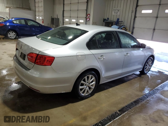 2012 Volkswagen Jetta Sedan SE w/Convenience & Sunroof with VIN 3VWDX7AJXCM401907, listed as a Copart auction lot 53448685 with 122,024 mi miles and Salvage Title. Bid and sale history available at carsss.com. Image 3.