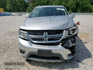 2012 Dodge Journey SXT с VIN 3C4PDCBG9CT134396, выставлен на аукционе Copart как лот 56179615 с пробегом 119 050 миль миль и Списание • Salvage title. История ставок и продаж доступна на DreamBid. Изображение 14.