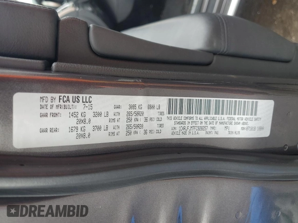 2015 Jeep Grand Cherokee Summit with VIN 1C4RJFJM7FC928257, listed as a Copart auction lot 82525714 with 148,208 mi miles and Salvage Title. Bid and sale history available at carsss.com. Image 15.