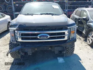 2021 Ford F-150 XL with VIN 1FTFW1E55MFC59394, listed as a IAAI auction lot 41675660 with 90,808 mi miles and . Bid and sale history available at DreamBid. Image 12.