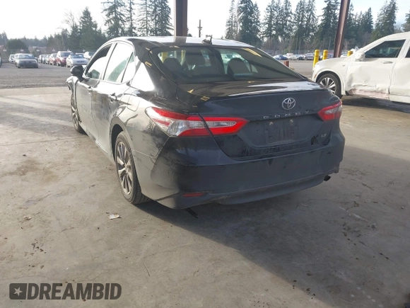 2020 Toyota Camry LE with VIN 4T1C11AKXLU363530, listed as a IAAI auction lot 41670307 with 86,459 mi miles. Bid and sale history available at carsss.com. Image 3.