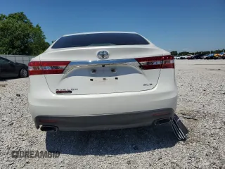 2014 Toyota Avalon Limited z VIN 4T1BK1EB4EU089540, wystawiony jako Copart lot #56886765 z przebiegiem 88 278 mil mil oraz Szkoda całkowita • Salvage title. Historia ofert i sprzedaży dostępna na DreamBid. Obrazek 6.