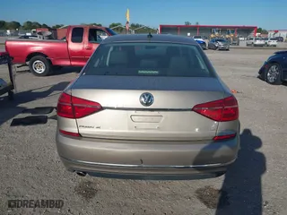 2016 Volkswagen Passat 1.8T SE w/Technology with VIN 1VWBS7A38GC018059, listed as a IAAI auction lot 41684959 with 44,850 mi miles. Bid and sale history available at carsss.com. Image 15.