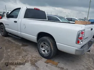 2002 Dodge 1500 z VIN 1D7HA16N62J201753, wystawiony jako IAAI lot #42400336 z przebiegiem 112 782 mil mil oraz . Historia ofert i sprzedaży dostępna na DreamBid. Obrazek 3.