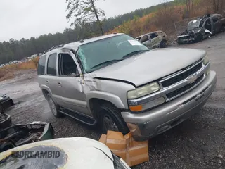 2004 Chevrolet Tahoe LT with VIN 1GNEC13Z24R160211, listed as a IAAI auction lot 41465076 with 229,612 mi miles. Bid and sale history available at carsss.com. Image 1.