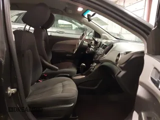 2015 Chevrolet Sonic LT with VIN 1G1JC5SH4F4163515, listed as a IAAI auction lot 41962147 with 133,104 mi miles and . Bid and sale history available at DreamBid. Image 5.