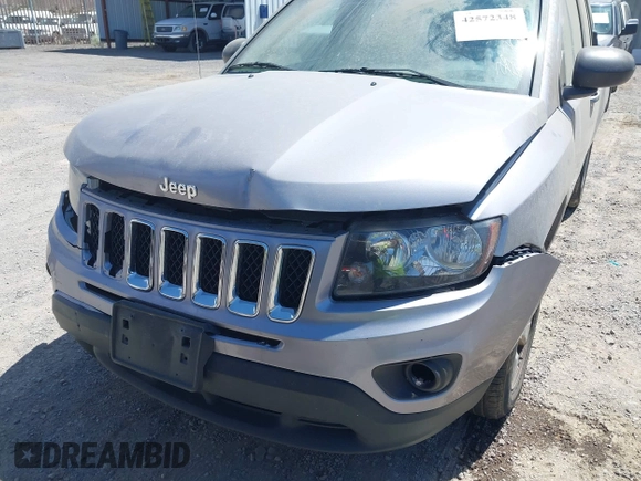 2016 Jeep Compass Sport with VIN 1C4NJCBB2GD577084, listed as a IAAI auction lot 42572348 with 164,234 mi miles and . Bid and sale history available at DreamBid. Image 6.