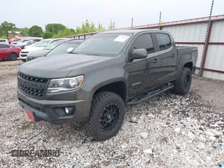 2018 Chevrolet Colorado 4WD LT z VIN 1GCGTCEN2J1235085, wystawiony jako IAAI lot #42192629 z przebiegiem 83 914 mil mil oraz . Historia ofert i sprzedaży dostępna na DreamBid. Obrazek 2.