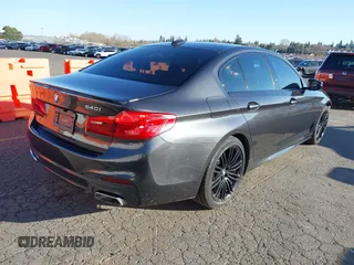 2018 BMW 5 Series 540i with VIN WBAJE5C58JG918692, listed as a IAAI auction lot 41665415 with 61,261 mi miles and . Bid and sale history available at carsss.com. Image 4.