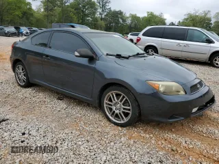 2007 Scion tC Spec z VIN JTKDE167570179636, wystawiony jako Copart lot #51235535 z przebiegiem 184 645 mil mil oraz Szkoda całkowita • Salvage title. Historia ofert i sprzedaży dostępna na DreamBid. Obrazek 4.