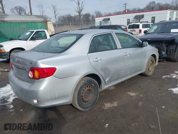 2009 Toyota Corolla with VIN 1NXBU40E19Z009548, listed as a IAAI auction lot 41310085 with 122,944 mi miles. Bid and sale history available at carsss.com. Image 4.