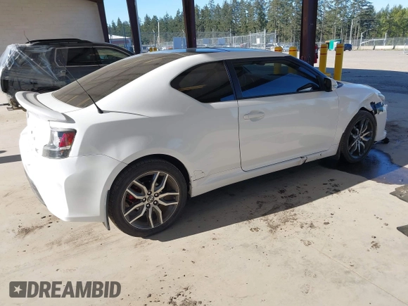 2014 Scion tC with VIN JTKJF5C7XE3073478, listed as a IAAI auction lot 42058385 with 151,491 mi miles. Bid and sale history available at carsss.com. Image 4.