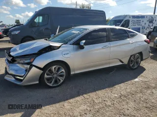 2018 Honda Clarity Plug-In Hybrid with VIN JHMZC5F12JC015478, listed as a Copart auction lot 73971644 with 64,031 mi miles and Clean Title. Bid and sale history available at carsss.com. Image 1.